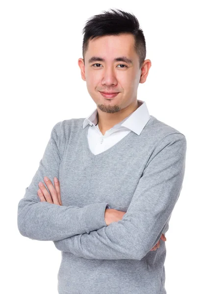 Young asian businessman in grey sweater — Stock Photo, Image