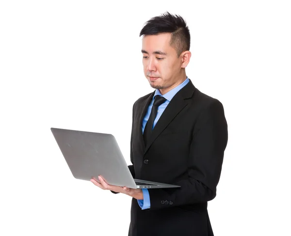 ビジネス スーツでアジア系の若いビジネスマン ストック画像