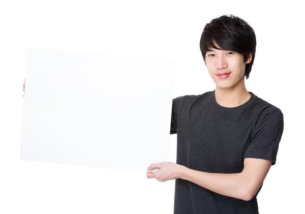 Asian young man in grey t-shirt — Stock Photo, Image