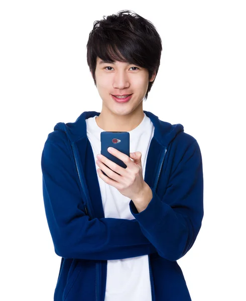 Asian young man in blue sweater — Stock Photo, Image