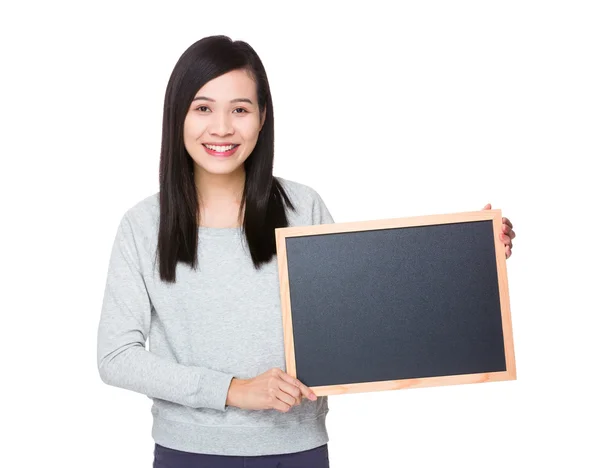 Asiatische junge Frau im grauen Pullover — Stockfoto