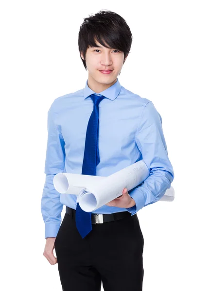 Young asian engineer with blue print — Stock Photo, Image