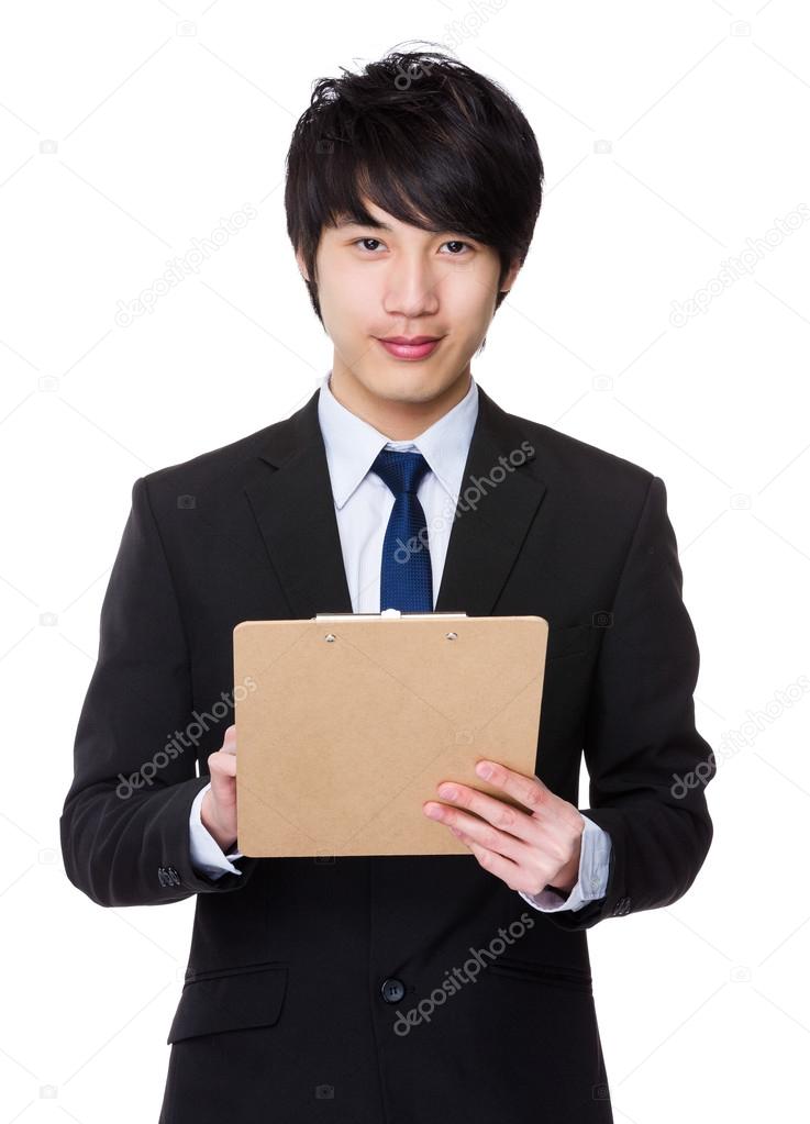 Young asian businessman in business attire