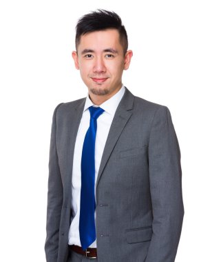 İş takım elbiseli genç Asyalı işadamı