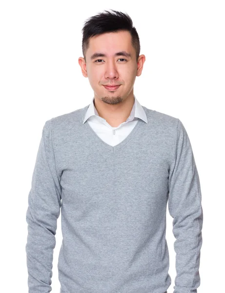 Junger asiatischer Geschäftsmann im grauen Pullover — Stockfoto