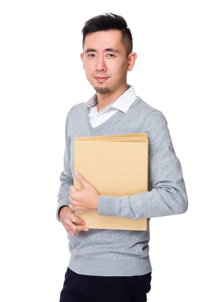 Young asian businessman in grey sweater — Stock Photo, Image