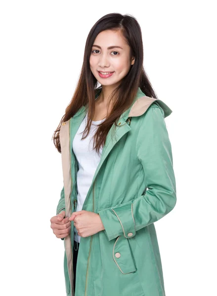 Asian young woman in green coat — Stock Photo, Image