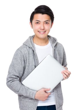 Asya genç adam gri süveterli