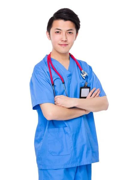 Azjatycki lekarz mężczyzna w niebieskim mundurze — Zdjęcie stockowe