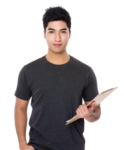 Young asian man in grey t-shirt — Stock Photo, Image