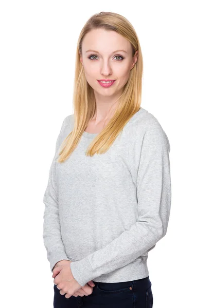 Branca jovem mulher em camisola cinza — Fotografia de Stock