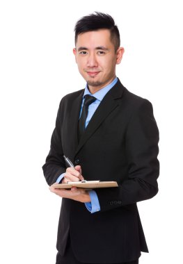 İş takım elbiseli genç Asyalı işadamı