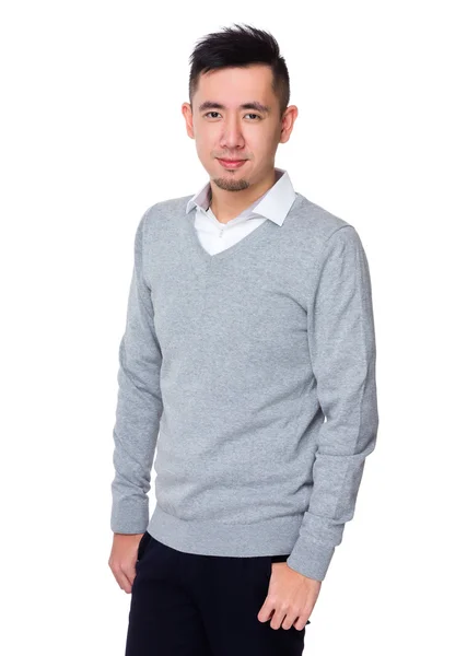 Young asian businessman in grey sweater — Stock Photo, Image