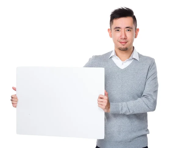 Young asian businessman in grey sweater — Stock Photo, Image