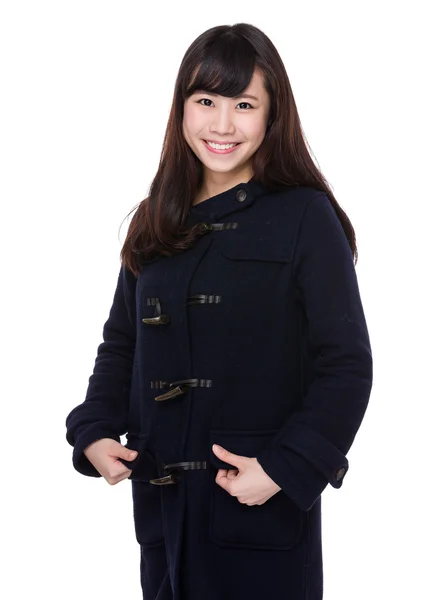 Asian young woman in black coat — Stock Photo, Image