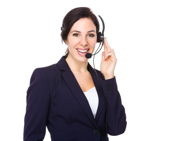 Assistente de atendimento ao cliente com fone de ouvido — Fotografia de Stock