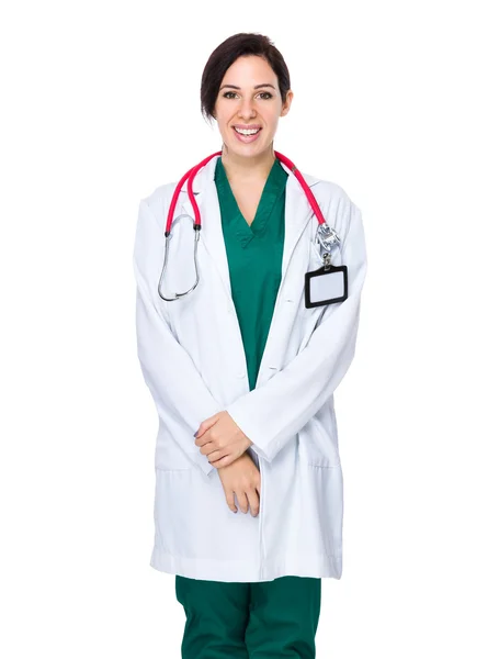 Mladá žena doktor v bílém plášti — Stock fotografie