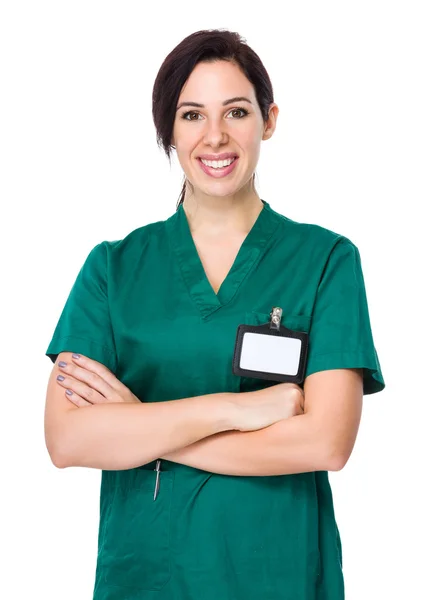 Mladý ženský lékař v zelené uniformě — Stock fotografie