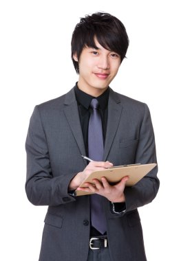 İş takım elbiseli genç Asyalı işadamı