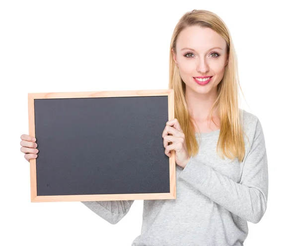 Kaukasische junge Frau im grauen Pullover — Stockfoto