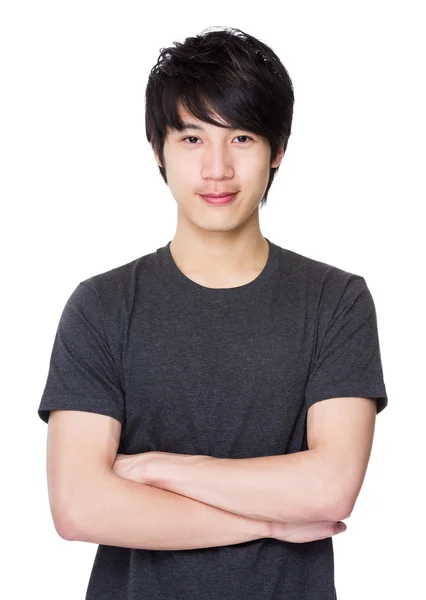 Asiático joven hombre en gris camiseta — Foto de Stock