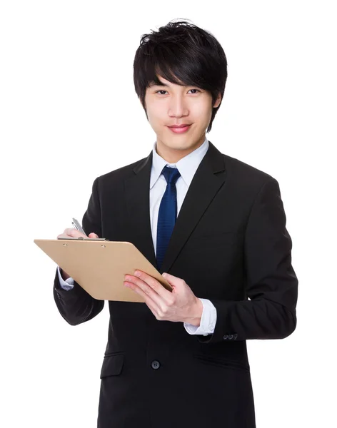 Young asian businessman in business suit Royalty Free Stock Photos