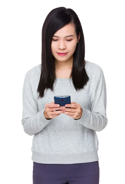 Asian young woman in grey sweater — Stock Photo, Image