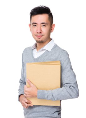 Genç Asyalı işadamı gri süveterli