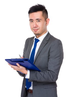 İş takım elbiseli genç Asyalı işadamı