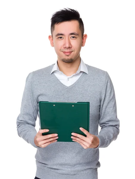 Young asian businessman in grey sweater — Stock Photo, Image