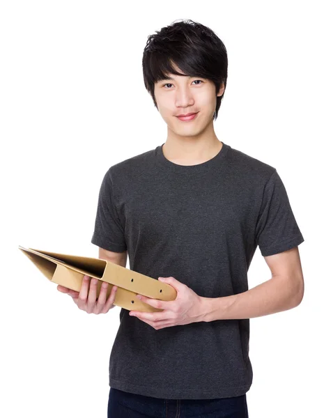 Asiático joven hombre en gris camiseta —  Fotos de Stock