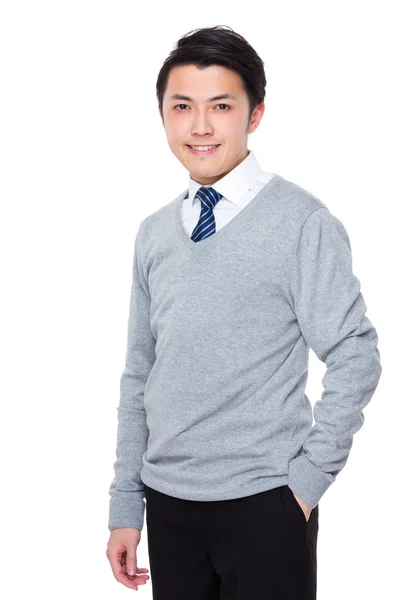 Junger asiatischer Geschäftsmann im grauen Pullover — Stockfoto