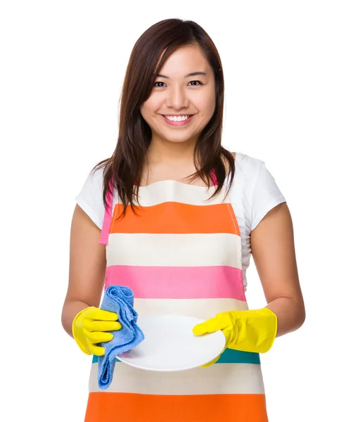 Asian young housewife in apron — Stock Photo, Image