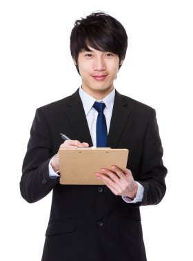 İş takım elbiseli genç Asyalı işadamı