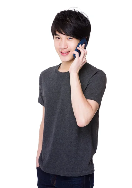 Aziatische jonge man in grijs t-shirt — Stockfoto