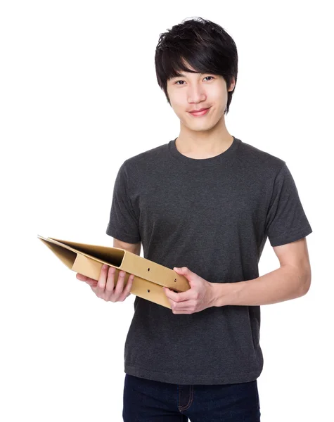 Asian young man in grey t-shirt — Stock Photo, Image