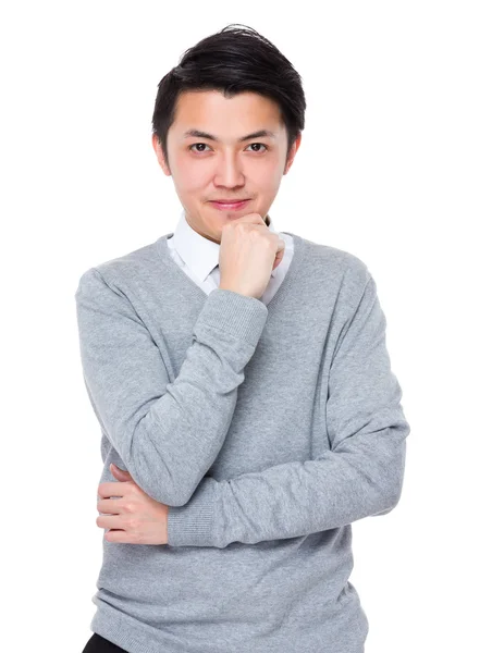 Joven asiático hombre de negocios en gris suéter — Foto de Stock