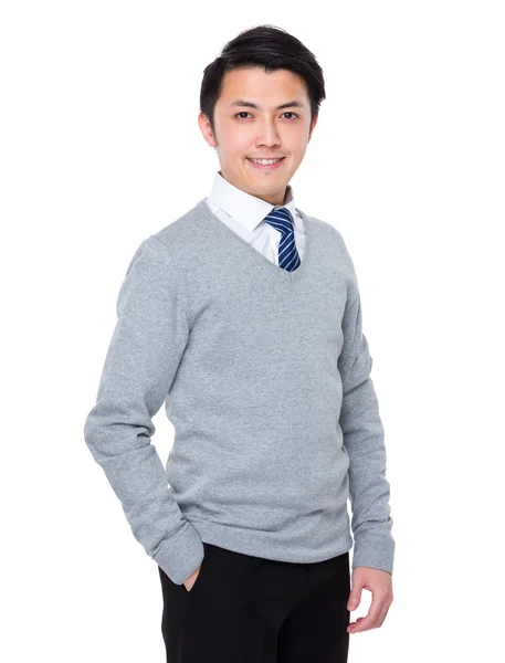 Junger asiatischer Geschäftsmann im grauen Pullover — Stockfoto