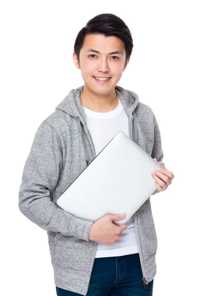 Asiatiska ung man i grå tröja — Stockfoto