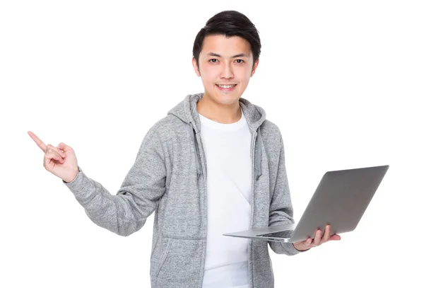 Asian young man in grey sweater — Stock Photo, Image