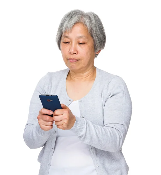 Asiatische alte Frau in grauer Strickjacke — Stockfoto
