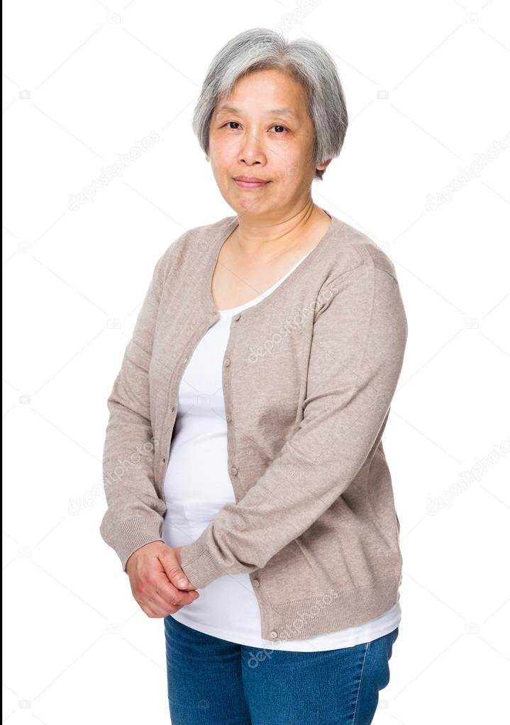 Asian old woman in beige cardigan