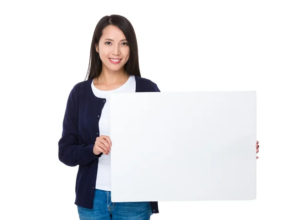 Aziatische jonge vrouw in blauwe vest — Stockfoto