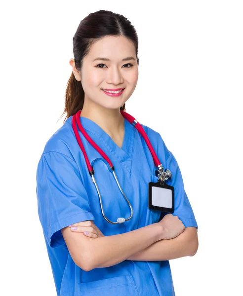 亚洲女医生穿着蓝色制服 — 图库照片