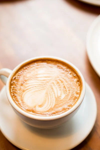 Cup of coffee on table — Stock Photo, Image