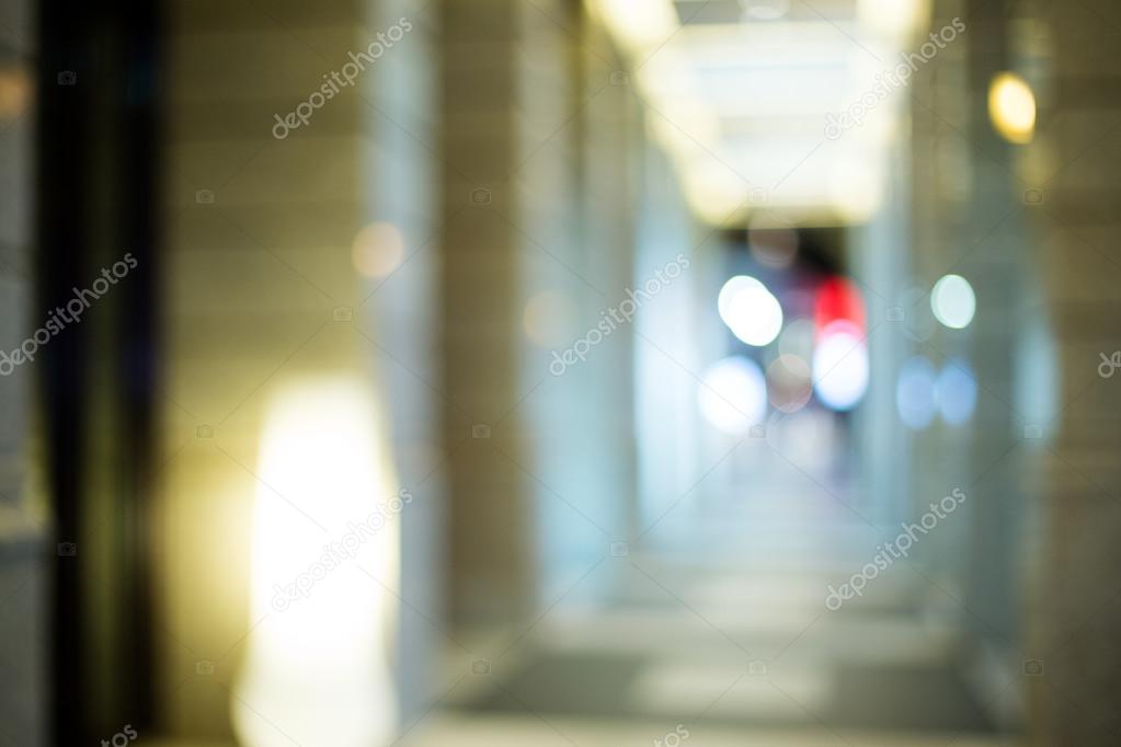 Abstract urban background with blurred buildings and street