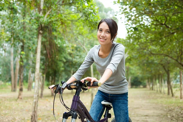 Woman enjoy riding a bike — Stock Photo, Image