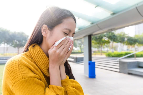 Asian young woman blowing nose — Stock Photo, Image
