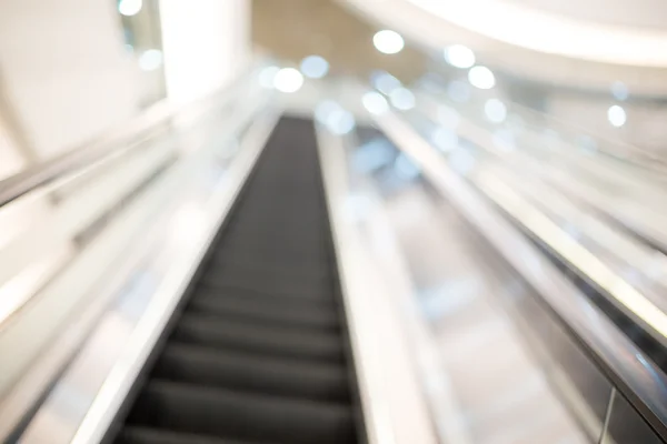 Oskärpa rulltrappa med bokeh för bakgrund — Stockfoto