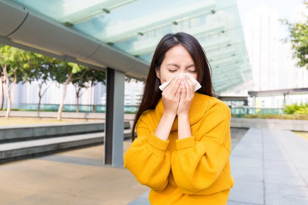 Asian young woman blowing nose — Stock Photo, Image